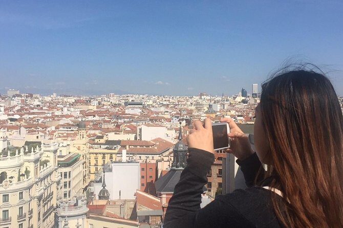 Architecture tour Gran Vía from its best rooftops 20thC - Plaza de España rooftop finish: Royal Palace views and a drink option