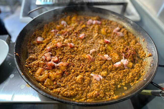 Authentic Paella in Madrid: A Hands-On Class with Tapas & Sangria - Sangria and tapas during cooking: the smart add-ons