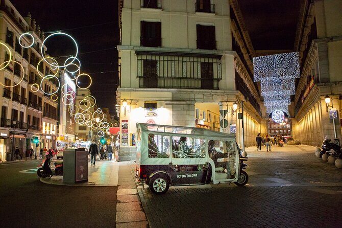 Christmas Lights Tour of Madrid in Eco Tuk Tuk Private - Puerta de Alcalá to Salamanca: starting where Madrid feels grand