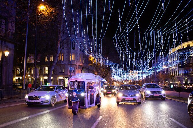 Christmas Lights Tour of Madrid in Eco Tuk Tuk Private - Cibeles Square: where the famous fountain turns into a night show