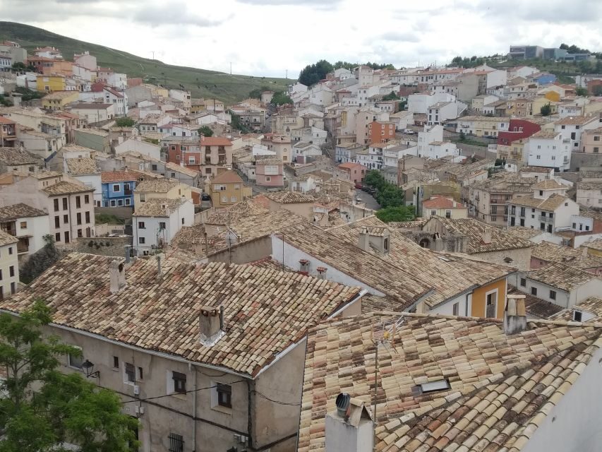 Cuenca: Nighttime Highlights Walking Tour in Spanish - The Hanging Houses at Night: 14th-Century Oddity Explained