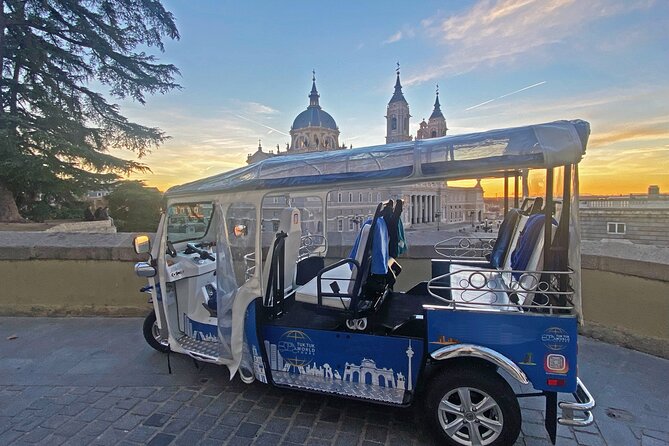 Eco Friendly Tuk Tuk Experience with the Local in Madrid - Royal Palace and Almudena Cathedral: big scale, quick orientation