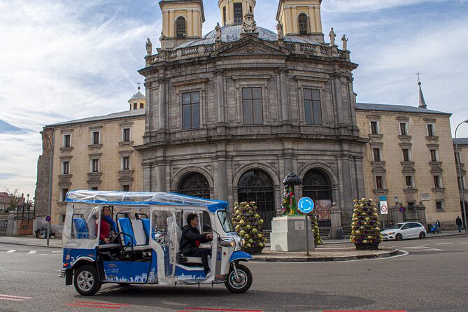 Eco Friendly Tuk Tuk Experience with the Local in Madrid - San Miguel Market and the Botín Guinness-record story