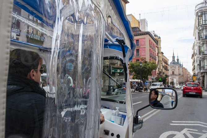 Eco Friendly Tuk Tuk Experience with the Local in Madrid - Plaza el Ángel, Neptune Fountain, and Paseo del Prado