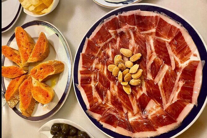 Experience Private Tapas and Wine Tour in Madrid - Plaza Mayor start: wines, tapas, and four different bar concepts