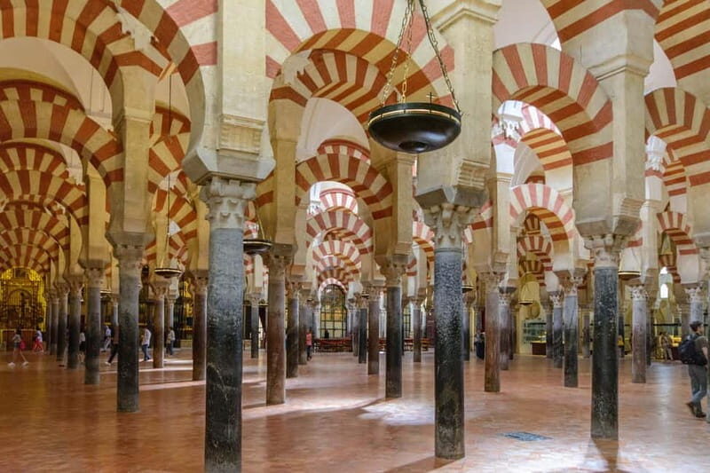 From Madrid: Cordoba and Mosque Day Trip by High-Speed Train - Historic center walk: from Roman Bridge vibes to the Alcázar photo stop