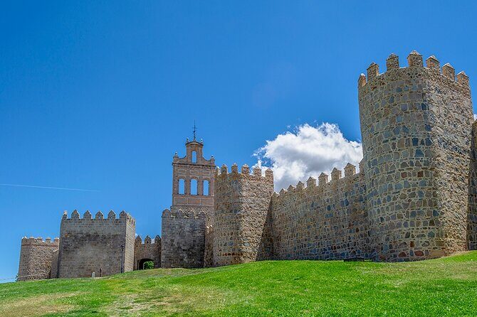 From Madrid: Full-Day Medieval Tour in Toledo and Ávila - Catedral de Ávila: a Romanesque-Gothic cathedral that feels fortified