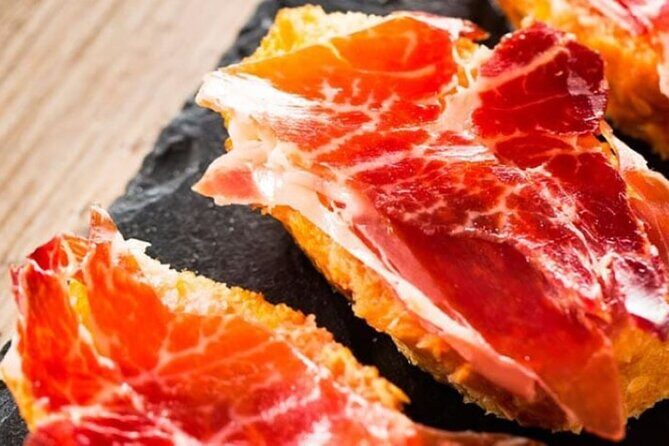Gastronomic Tour: Discover the best “Wines and Tapas of Madrid” - Mercado Jamón Ibérico: acorn-fed ham, cheeses, and oils