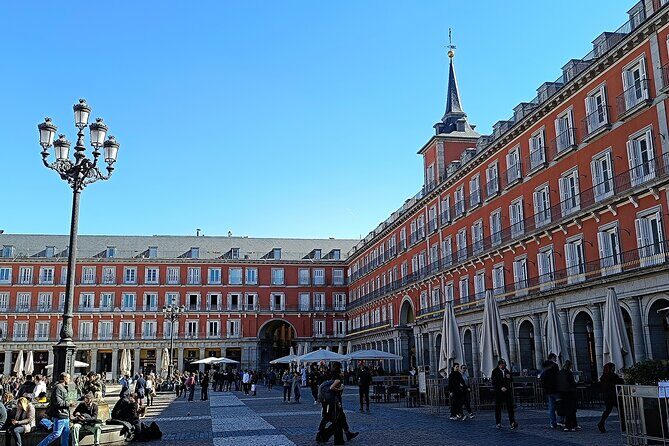 Highlights of Madrid - Small Group Walking Tour - Plaza Mayor: Old Madrid’s Stage for Legends and Life