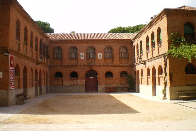 Las Ventas Madrid Bullring & Bullfighting Museum with Audioguide - Callejón and the Door of Madrid: moving like a matador
