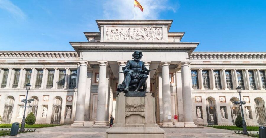 Madrid: 2-Hour City Highlights Guided Walking Tour - Royal Palace entrance: the finish line for photos and next steps
