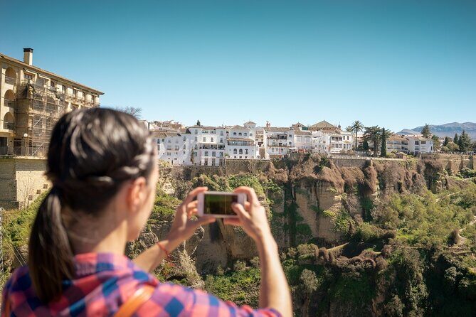 Madrid, Andalusia with Cordoba, Costa del Sol & Toledo 9-Day Tour - Madrid Orientation: Puerta del Sol, Plaza Mayor, and the Royal Palace Backdrop