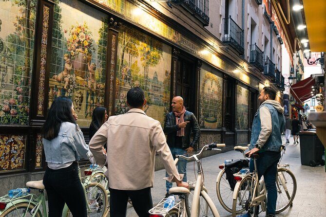 Madrid at Night: Vintage Bike Tour of City Highlights - Plaza de España and Plaza de la Villa: Madrid’s layered center