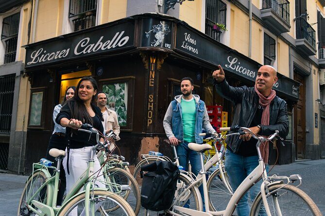 Madrid at Night: Vintage Bike Tour of City Highlights - Puerta del Sol: the Sun’s Gate and the heartbeats of central Madrid