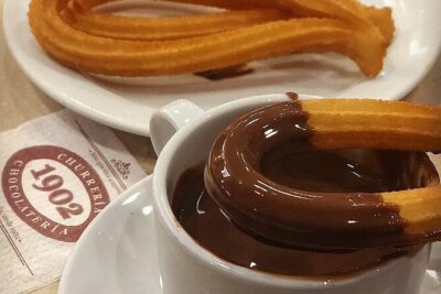 Madrid Bike Tour with Churros and Wine, Ham, and Cheese Upgrade - Getting started at Cervecería 100 Montaditos at 10:00 am