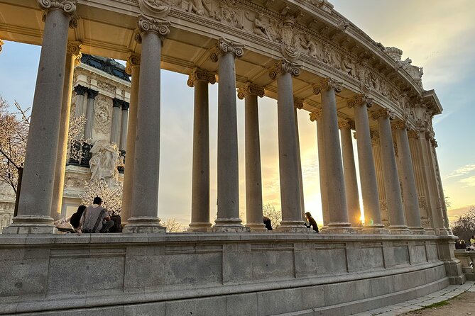 Madrid Bike Tour with Churros and Wine, Ham, and Cheese Upgrade - The Gran Vía building: early 1900s style that loves photos