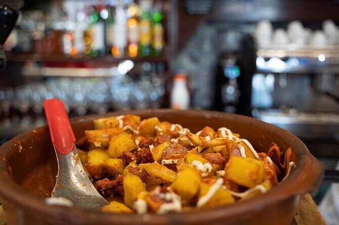Madrid by Night: Tapas Crawl, Local Drinks & Hidden Gems - Stop 1: Plaza de la Villa and the start of the tapas idea