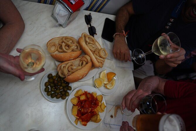 Madrid by Night: Tapas Crawl, Local Drinks & Hidden Gems - Stop 3: La Latina with a tiny, six-table tapas room