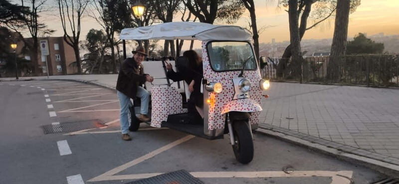 Madrid: City Tours - 6 seats private ecological tuk tuk - Riding into Madrid from the Opera area