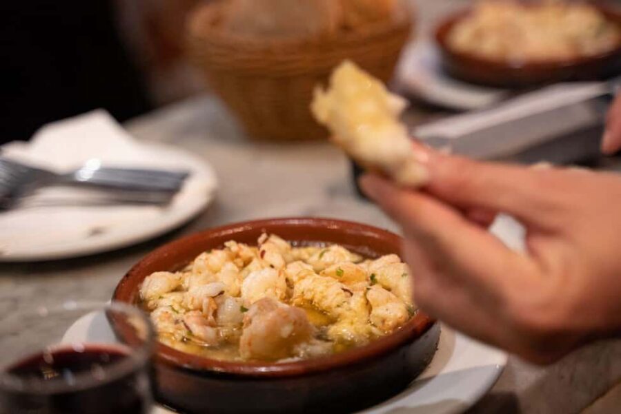 Madrid: Evening Tapas Tour with 5 Delicious Stops & Drinks - Plaza Mayor: bocadillo de calamares and local beer