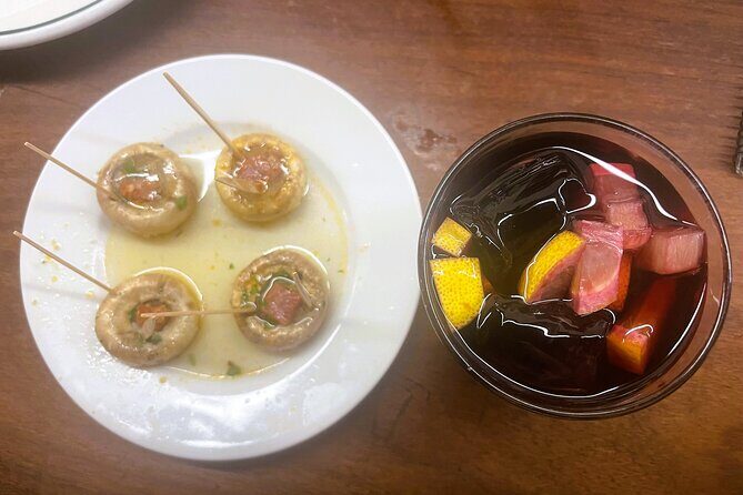 Madrid Food Tasting Tour of Hidden Gems (Small Groups) - Stop 3: Jamón Ibérico and Tortilla Madrileña in a Historic Setting