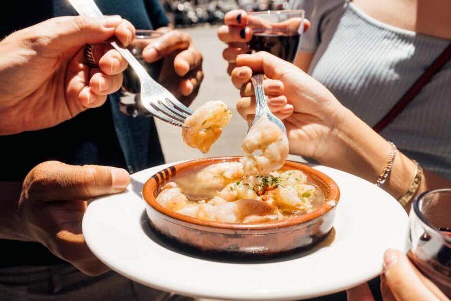 Madrid: Food Walking Tour with Drink and Local Guide - Why La Latina and tapas fit a 2.5-hour walk so well