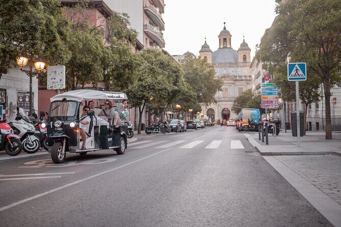 Madrid Historical Tour with Local Guide in Eco Tuk Tuk Private - Cibeles and Plaza del Dios de Mar: the football city lesson in stone
