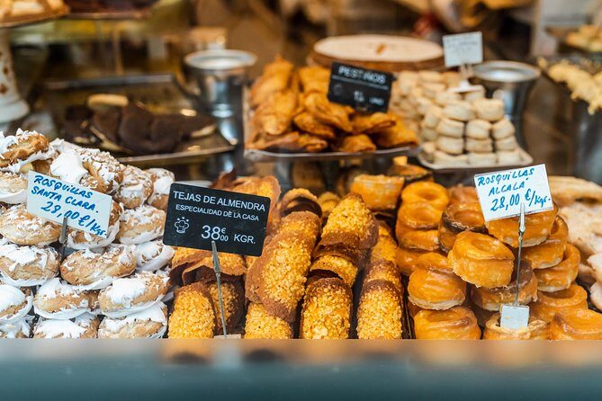 Madrid Icons & Hidden Gems: Private Custom Tour with a Local - Stop 2: Plaza Mayor, red-brick arcades, and the city’s social center