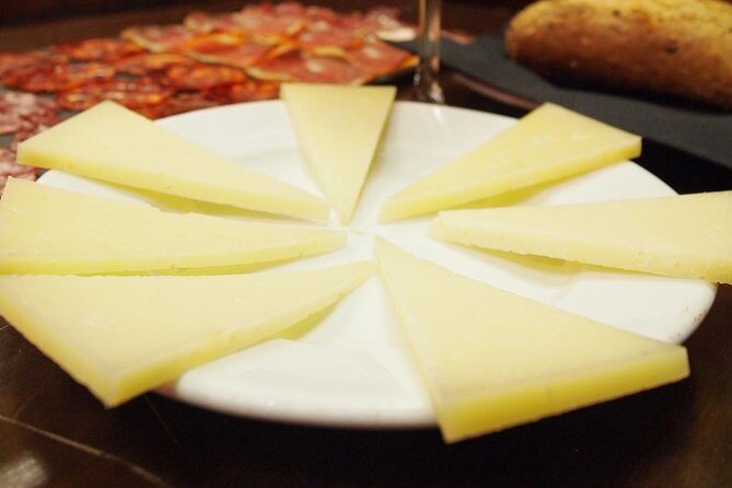 Madrid Local's Wine and Tapas Lunch Tour with a side of History - Two traditional taverns (plus extra stops): how the wine tasting stays fun