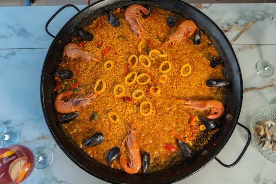 Madrid: Paella and Sangria Workshop with Tapas - Paella Workshop: From Pan Prep to the Big Sit-Down