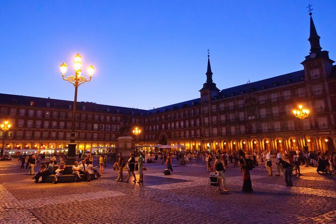 Madrid Private Night Walking Custom Tour with Tapa and a Drink - Plaza Mayor after dark: the main square, but with mood