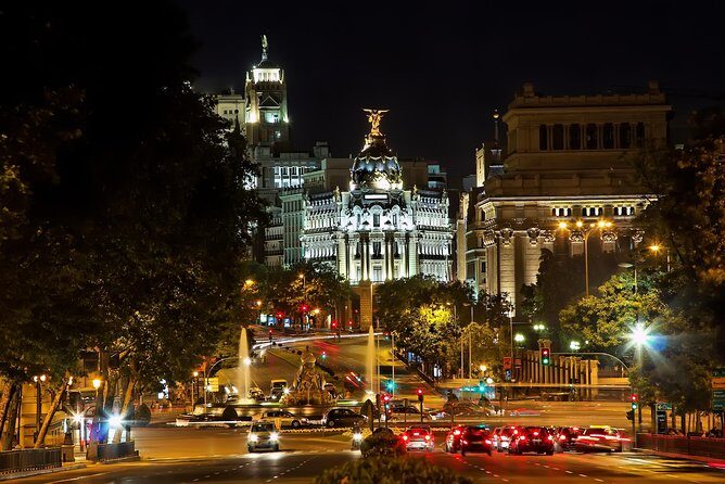 Madrid Private Night Walking Custom Tour with Tapa and a Drink - Royal Palace area: seeing power when the lights come on