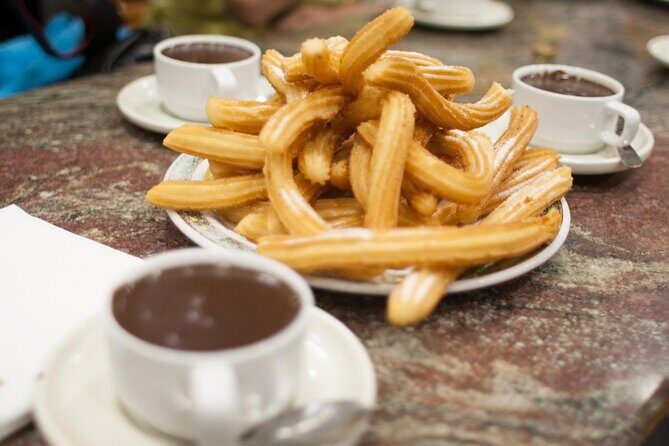 Madrid Segway Tour with Chocolate and Churros - Armory Square: Almudena Cathedral and the Royal Palace viewpoint