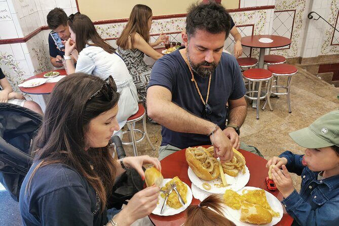 Madrid: Street Food Walking Tour in the Plaza Mayor Area - The local bar stop: Madrid’s calamari sandwich moment