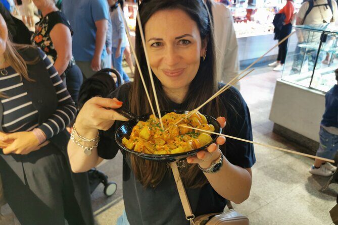 Madrid: Street Food Walking Tour in the Plaza Mayor Area - San Miguel market area tastings: wine, snacks, and an outdoor workaround