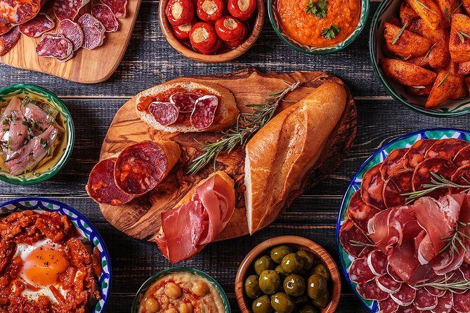Madrid Tapas Experience Walking Tour - Stop 1: SANDEMANs New Europe - Madrid and the tapas lineup that sets the tone