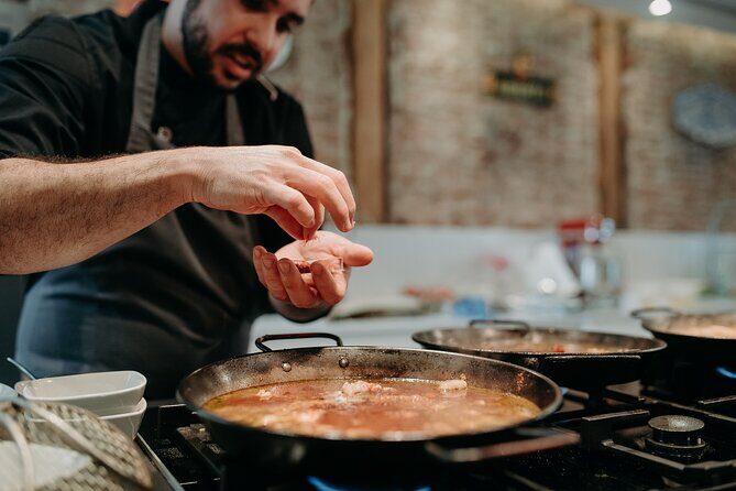 Madrid Tapas & Paella Cooking Experience with Local Market Visit - Mercado de Antón Martín: where your shopping actually teaches Spanish food