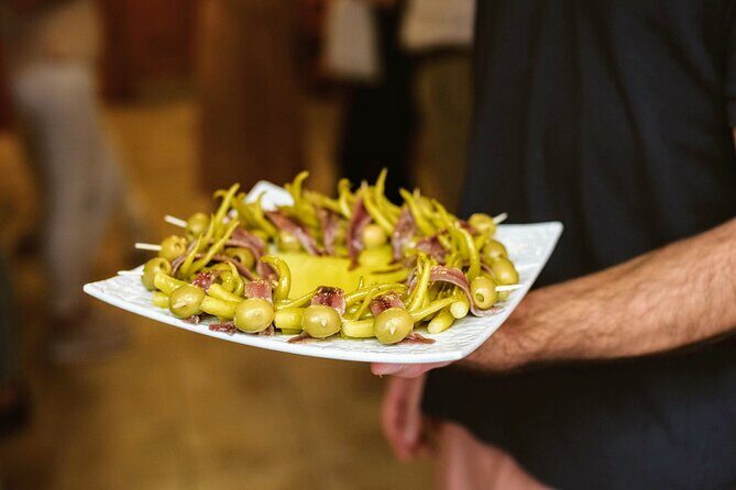 Madrid Tapas & Paella Cooking Experience with Local Market Visit - Lunch, seasonal fruit dessert, and beer or wine
