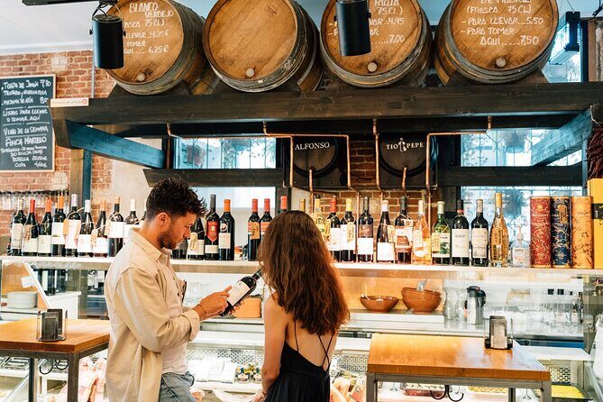 Madrid Tapas & Wine Tour with Rooftop Views and Local Guide - Starting at Plaza de San Miguel: where tapas culture actually lives