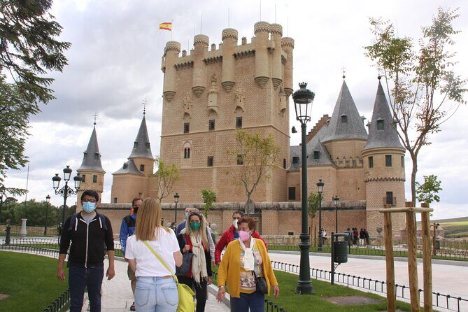 Madrid to Avila & Segovia: Full-Day Highlights Tour - Quick photo break in transit: a classic route to Segovia