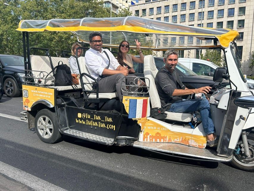Madrid: Traditional Tour wh Private guide in yellow Tuk Tuk - Start at Plaza Isabel II and Glide Toward Opera Madrid