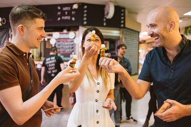 Madrid Ultimate Spanish Cuisine Food Tour - Stop 3: Mercado de Antón Martín for olives, olive oil, cured meats, and vermouth