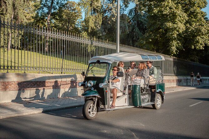 Madrid Welcome Tour with Local Guide in Eco Tuk Tuk Private - From the covered market to San Francisco el Grande: food smells and big-domed views