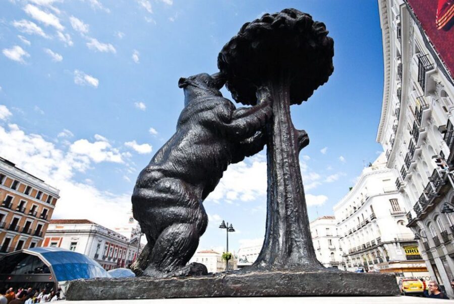 Private Madrid Highlights Walking Tour - Entering Madrid’s historic center from Plaza Mayor’s orbit