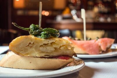 Private: Madrid Historic Centre Food Tour with 10+ Authentic - Stop 1: Pastry, a 180-year deli, then squid sandwich and vermouth