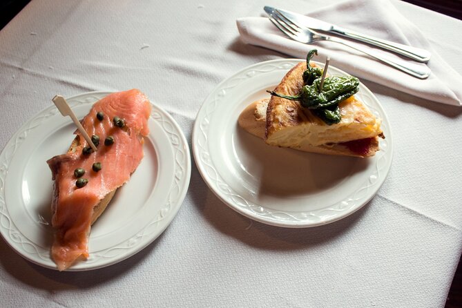 Private: Madrid Historic Centre Food Tour with 10+ Authentic - Puerta del Sol and Km 0: the city’s meeting point