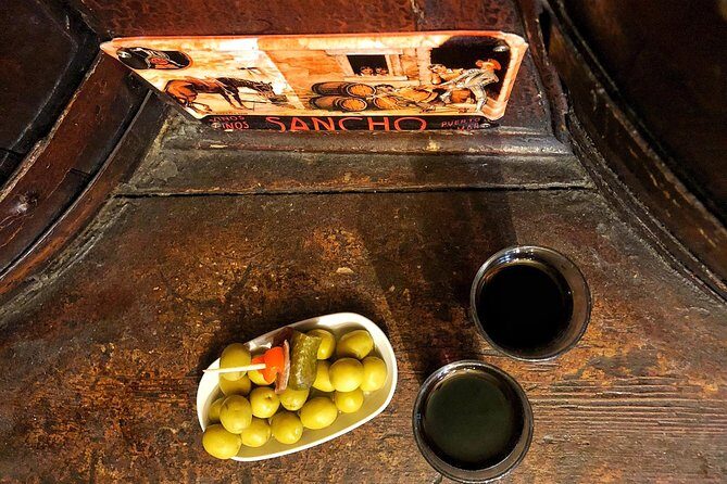 Private Wine & Gourmet Tapas Tour in Madrid with Sommelier - Stop Two: modern vermouth cocktail, plus meaty Gordal olives
