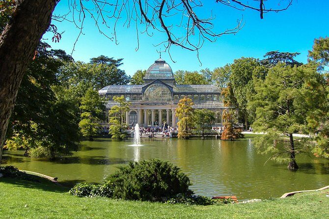 Skip-the-line Madrid Royal Palace with tapas tasting & Retiro Park - Entering the Royal Palace: big rooms, real lines, lots of audio time