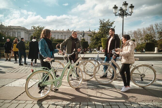 Tapas & Guided tour on a Vintage Bike through Madrid - Puerta de Alcalá and Puerta del Sol: iconic landmarks with personality