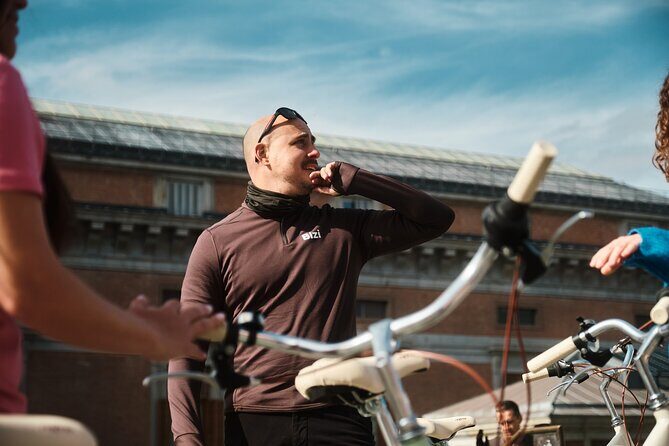 Tapas & Guided tour on a Vintage Bike through Madrid - Royal Palace area, Almudena Cathedral, and Plaza de la Villa